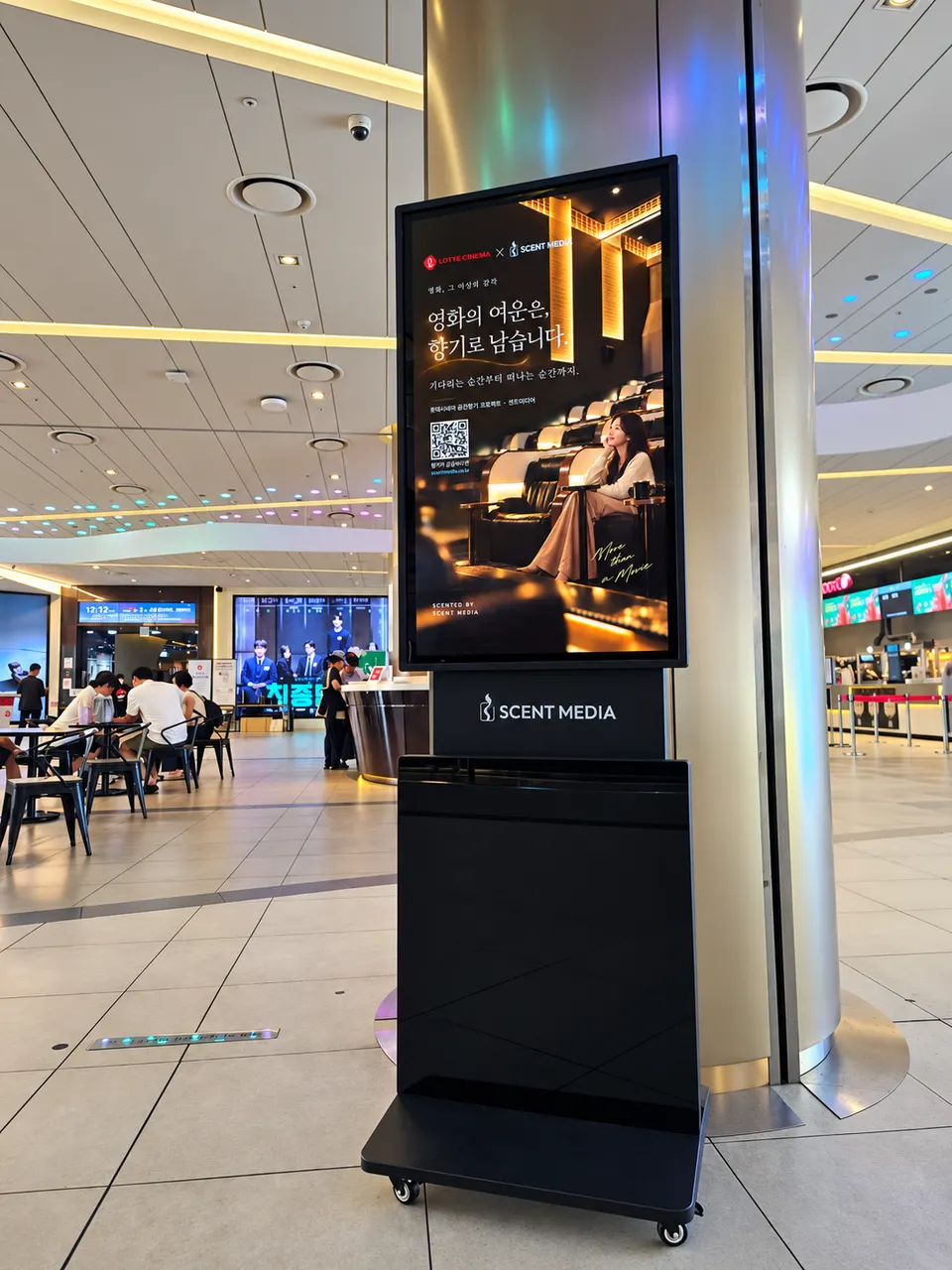 lotte cinema-scent media launch fragrance marketing collaboration at gangnam-dong entrance